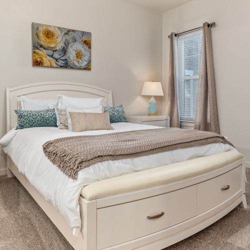 Bedroom with natural lighting and high ceilings